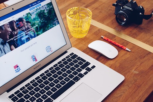 Woman looking at Facebook Ad Manager on her laptop